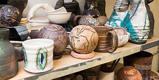 A shelf of pottery