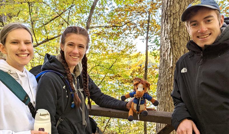 Honor students (Andrew Lorig, Katie Garner, and Emily Buckingham) at Lacey-Keosaqua State Park during the Fall 2022 Honors trip.
